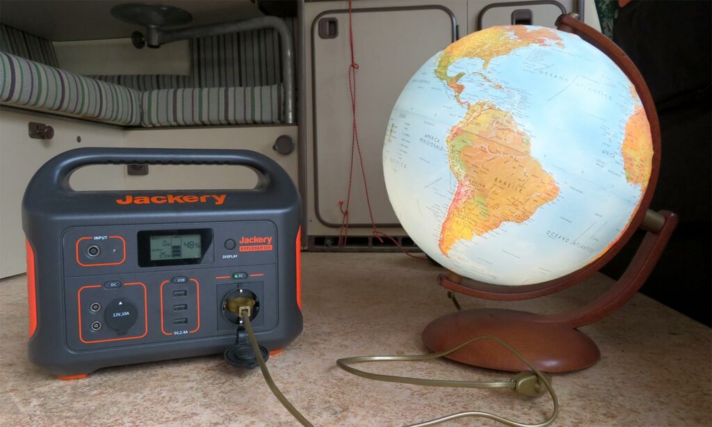 Jackery Explorer 500 setup in operation with illuminated globe